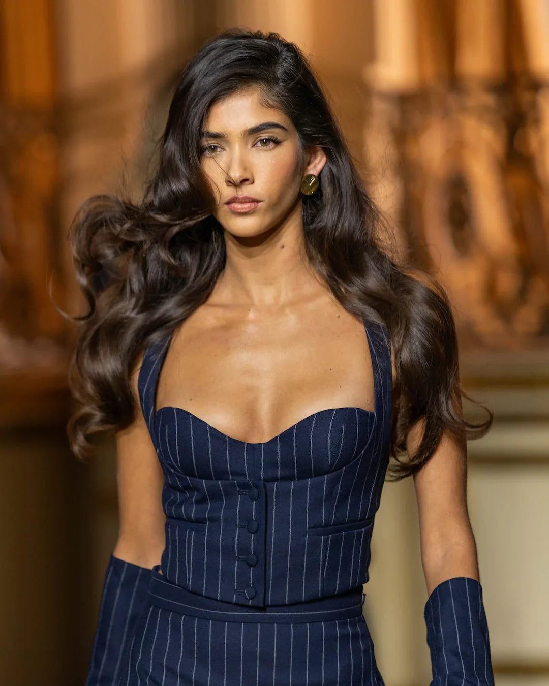 Model walking down runway